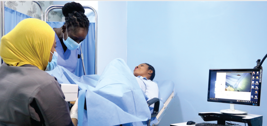 Reproductive health clinicians caring for a patient at St. Andrew Hospital